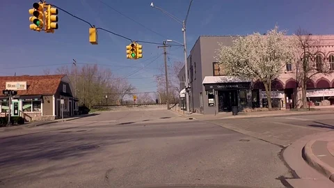 Spring drive through a small Michigan town Stock Footage 77490585