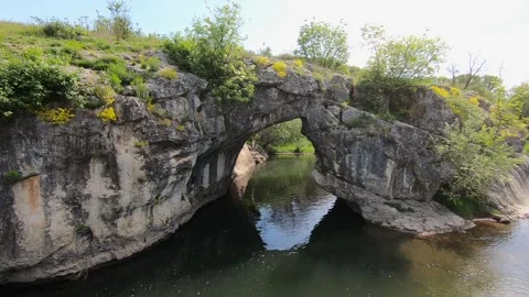 Spring Drone Video of the Rock Arch “The Arch” at Ăglen, Bulgaria, EU 2019 Stock Footage 323298403