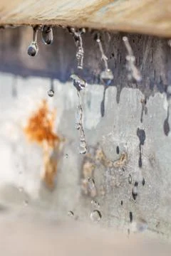 Spring drops on the street in a large macro the increase of the sun Stock Photos