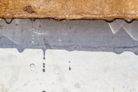 Spring drops on the street in a large macro the increase of the sun Stock Photos