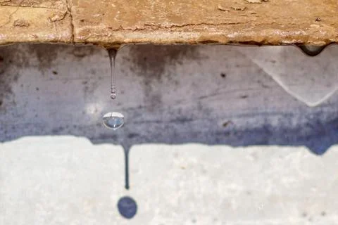 Spring drops on the street in a large macro the increase of the sun Stock Photos