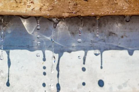 Spring drops on the street in a large macro the increase of the sun Stock Photos