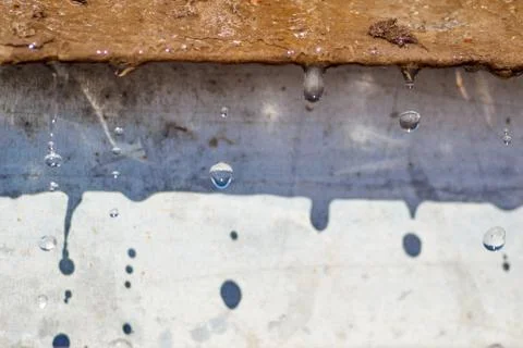 Spring drops on the street in a large macro the increase of the sun Stock Photos