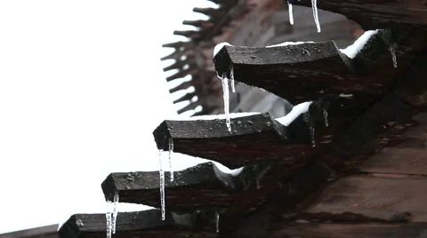 Spring drops under the old roof Stock Footage 61330522