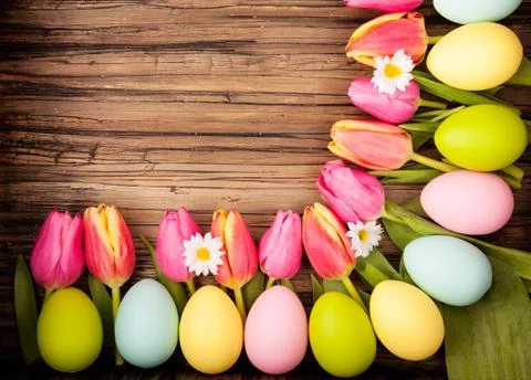 Spring easter background on wooden table Stock Photos
