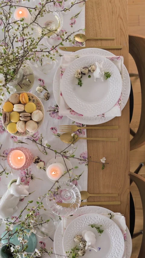 Spring Easter decor. Easter table setting. Flowers and dishes and candles for a Stock Footage 270243516