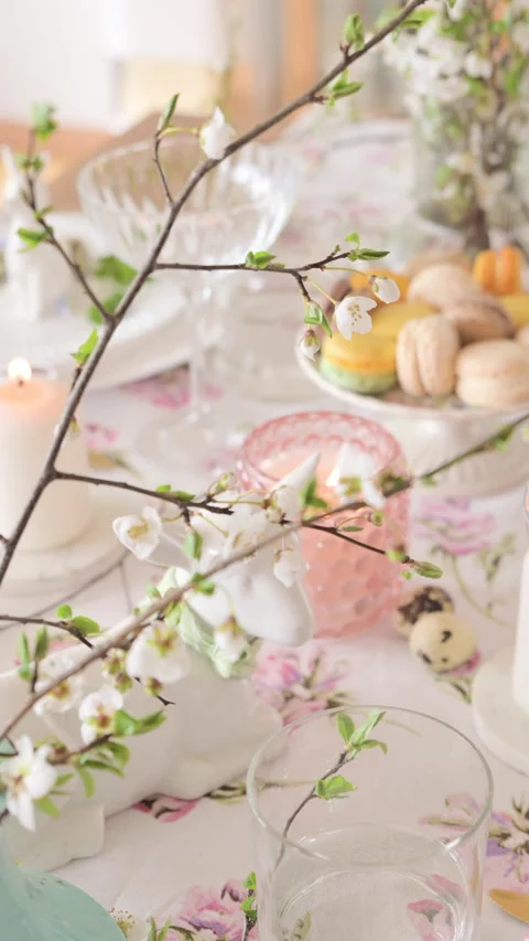 Spring Easter decor. Easter table setting. Flowers and dishes and candles for a Stock Footage 270243692