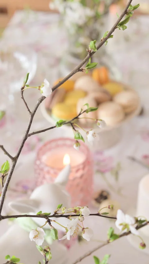 Spring Easter decor. Easter table setting. Flowers and dishes and candles for a Stock Footage 272816779