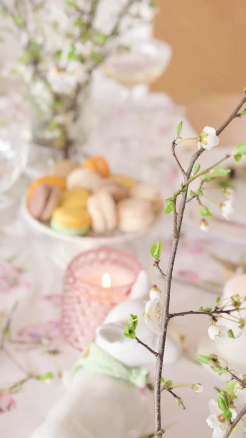 Spring Easter decor. Easter table setting. Flowers and dishes and candles for a Video stock 272816964
