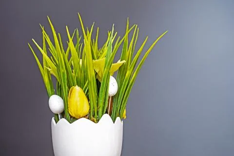 Spring Easter decorative bouquet with tulips on a gray background 스톡 사진