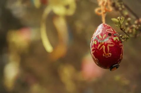 Spring Easter tree adorned with colorful painted eggs hanging from branches Stock Photos