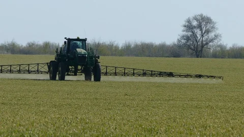 Spring farm work in the field. Stock Footage 128106054