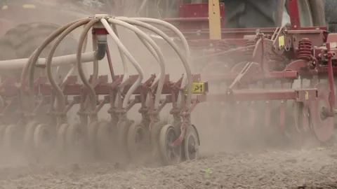 Spring field works. Tractor plowing the fields in spring. Video stock 102040176