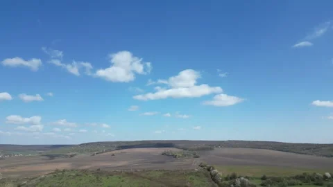 Spring fields surrounded by a small forest. Ukraine rural scene view from abo Stock Footage 242841726