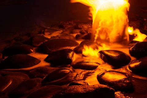Spring of fire water. Burning methane in water. Cold fire Stock-Fotos