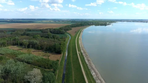 Spring flight above river dam of Kralova with side artificial channel visible 스톡 동영상 129468289