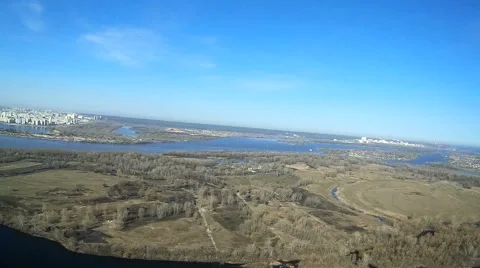 Spring Flight over  field and river in city vicinities. Aerial with lists Stock Footage 61751762