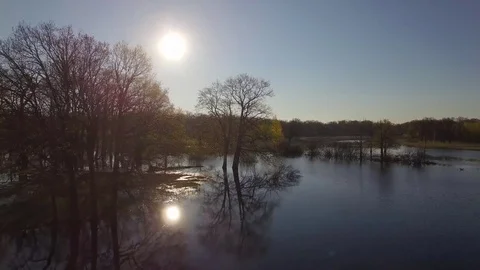 Spring flood at river bottomland 4k. Copter moving low above Pripyat overflowed  Stock Footage 77902593