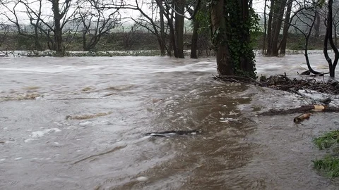 Spring Flooding And Fast Moving River Stock Footage 91864997