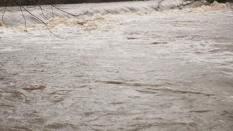 Spring Flooding And Fast Moving River Stock Footage 91865414