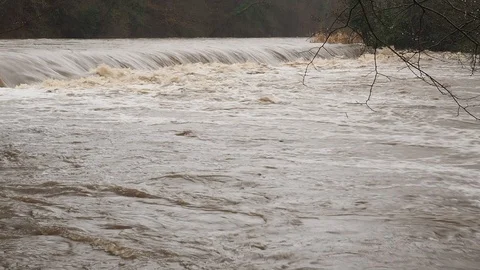 Spring Flooding And Fast Moving River Stock Footage 91865502