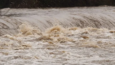 Spring Flooding And Fast Moving River Stock Footage 91866324