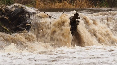 Spring Flooding And Fast Moving River Stock Footage 91866338