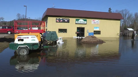 Spring flooding and rushing water after long cold snowy winter Stock Footage 39351619