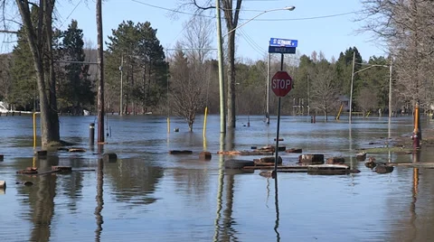 Spring flooding and rushing water after long cold snowy winter Stock Footage 39367900