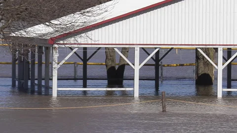 Spring flooding during record warm temperatures and weather conditions Stock Footage 150314053