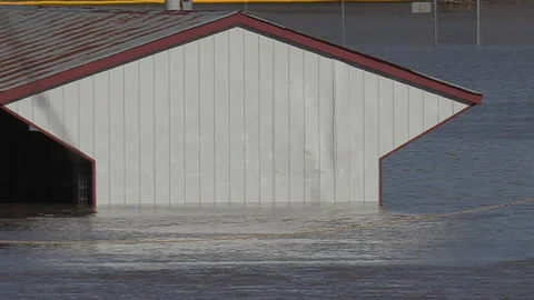 Spring flooding during record warm temperatures and weather conditions Stock Footage 150316848