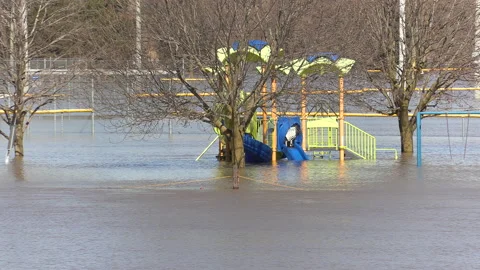 Spring flooding during record warm temperatures and weather conditions Stock Footage 150320259