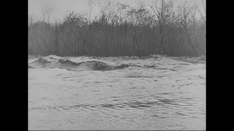 Spring floods rush down to sea, Chinese work on dikes to hold river - 1942-1949 Stock Footage 83714532