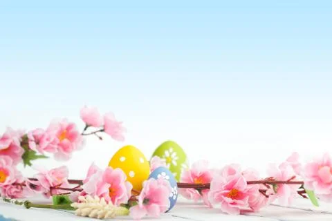 Spring flowers and colorful easter eggs Stock Photos