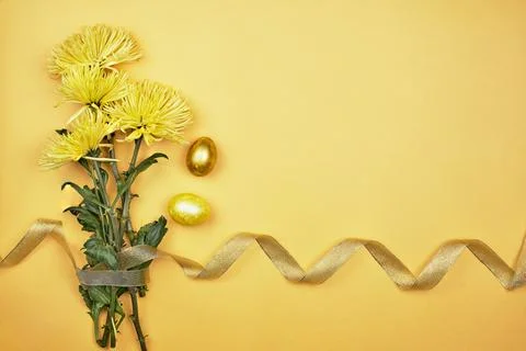 Spring flowers and Easter eggs Stock Photos