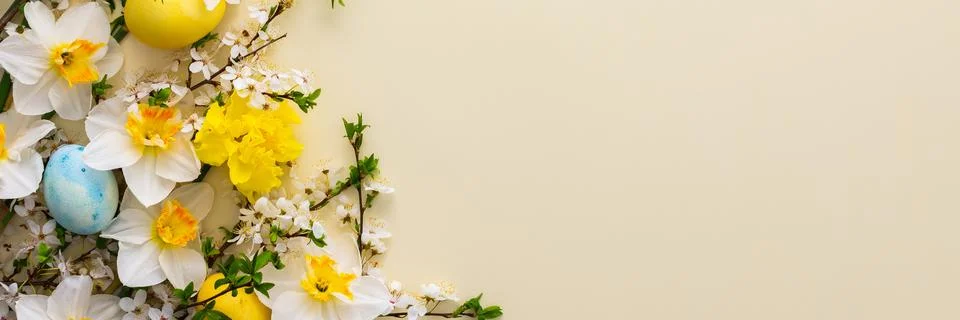 Spring flowers and Easter eggs Stock Photos