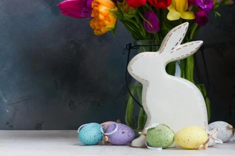 Spring flowers with easter rabbit and eggs Stock Photos