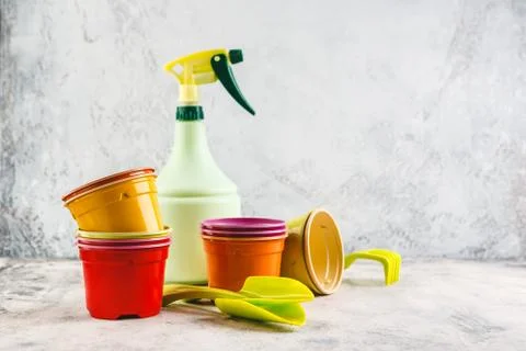 Spring flowers with gardening tools Stock Photos