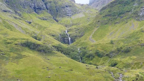 The spring flows from the mountain. Scotland. Stock Footage 81999341