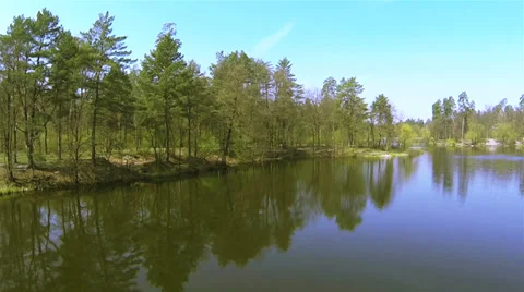 Spring  fly landscape with park and the lake. Aerial Video stock 37626504