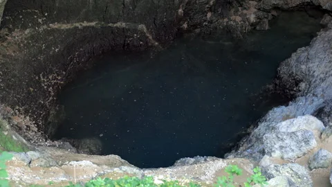 Spring of Fontaine de Vaucluse, source of the Sorgue river with a very low level Stock Footage 170152767