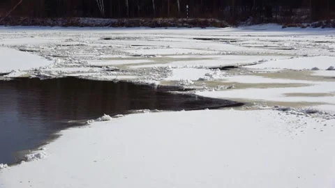 Spring, forest, and ice on the river 01 Stock Footage 250511292
