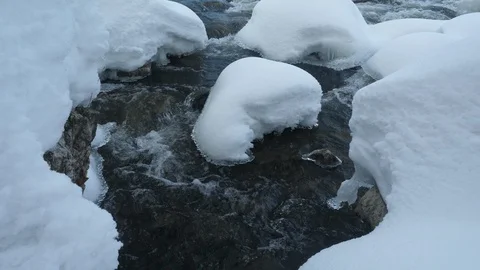 Spring forest river. Melting ice on the river, white snow on the river banks Stock Footage 125292987