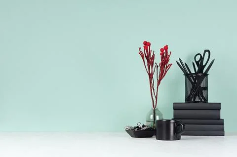 Spring green mint menthe interior of office with black stationery, books, cof Stock Photos