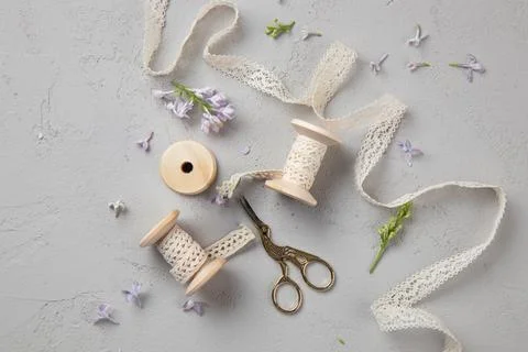 Spring Grey Background with flowers and ribbons Stock Photos