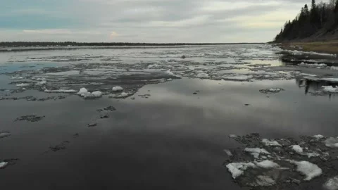 Spring ice drift, floating ice on the Usa River in the Komi Republic Stock Footage 169005524