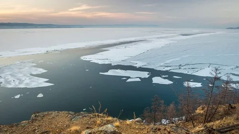 Spring ice drift at the northern lake Stock Footage 76763859
