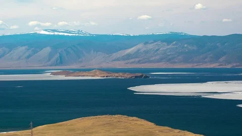 Spring ice drift at the northern lake Stock Footage 76899302