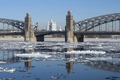 Spring ice drift at the Peter Great bridge. Saint-Petersburg, Russia Stock Photos
