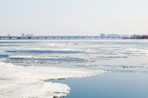 The spring ice drift on the river Volga. Road bridge in the city of Saratov Stock Photos